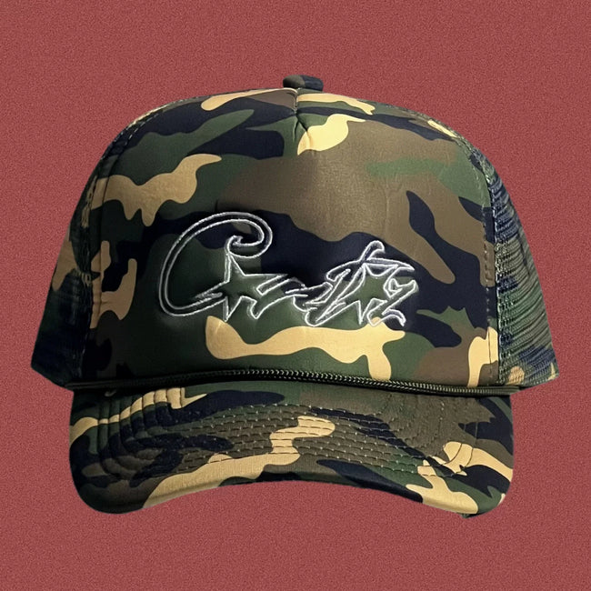 Corteiz Vintage Camo Trucker Hat with Signature Script Logo Hover Image